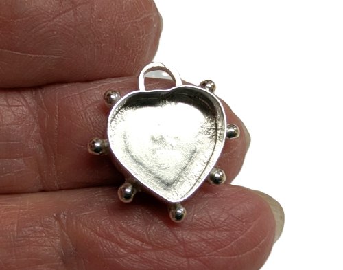 Judy Larson's Hearts and Flowers Charms - , Classic Wire Jewelry, Cutting, Cutting Tool, Cutters, Filing, Finishing, Butane Torch, Soldering, Solder, Design, File the ends to fit the curve of the bezel.